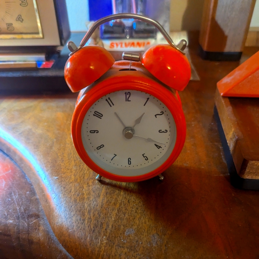 Antique looking Orange alarm clock, retro, fully functional